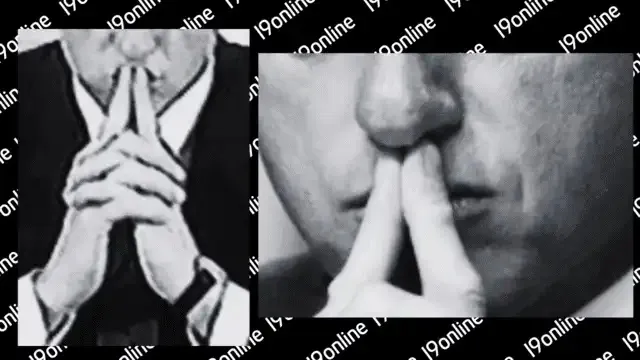 لمس الشفاه في لغة الجسد، حركات الفم في لغة الجسد شخص يضع اصبع يديه على فمه